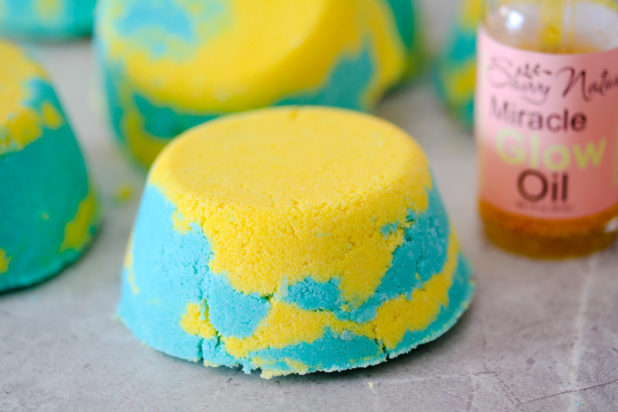 Lemon-Lime Bath Bombs are an invigorating blend of lime and lemon essential oil to make an all-natural refreshing bath bomb.  